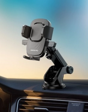 držák na mobilní telefon instalovaný na palubní desce automobilu