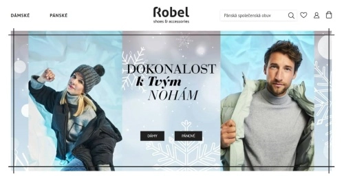 žena v zimní čepici, roláku a zimní bundě a muž v roláku a zimní bundě