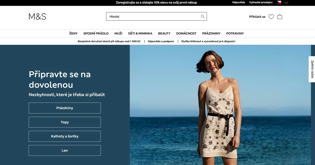 Homepage stránky Marks and Spencer s ženou u moře